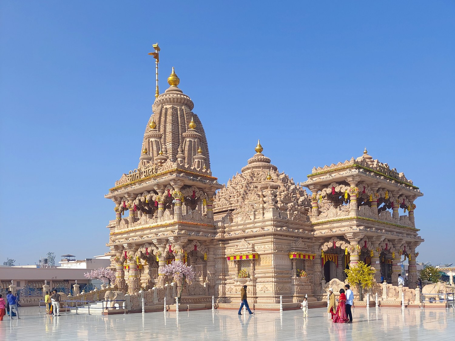 Kirti Mandir in Barsana, its carved sandstone spire and pavilions above a white marble courtyard